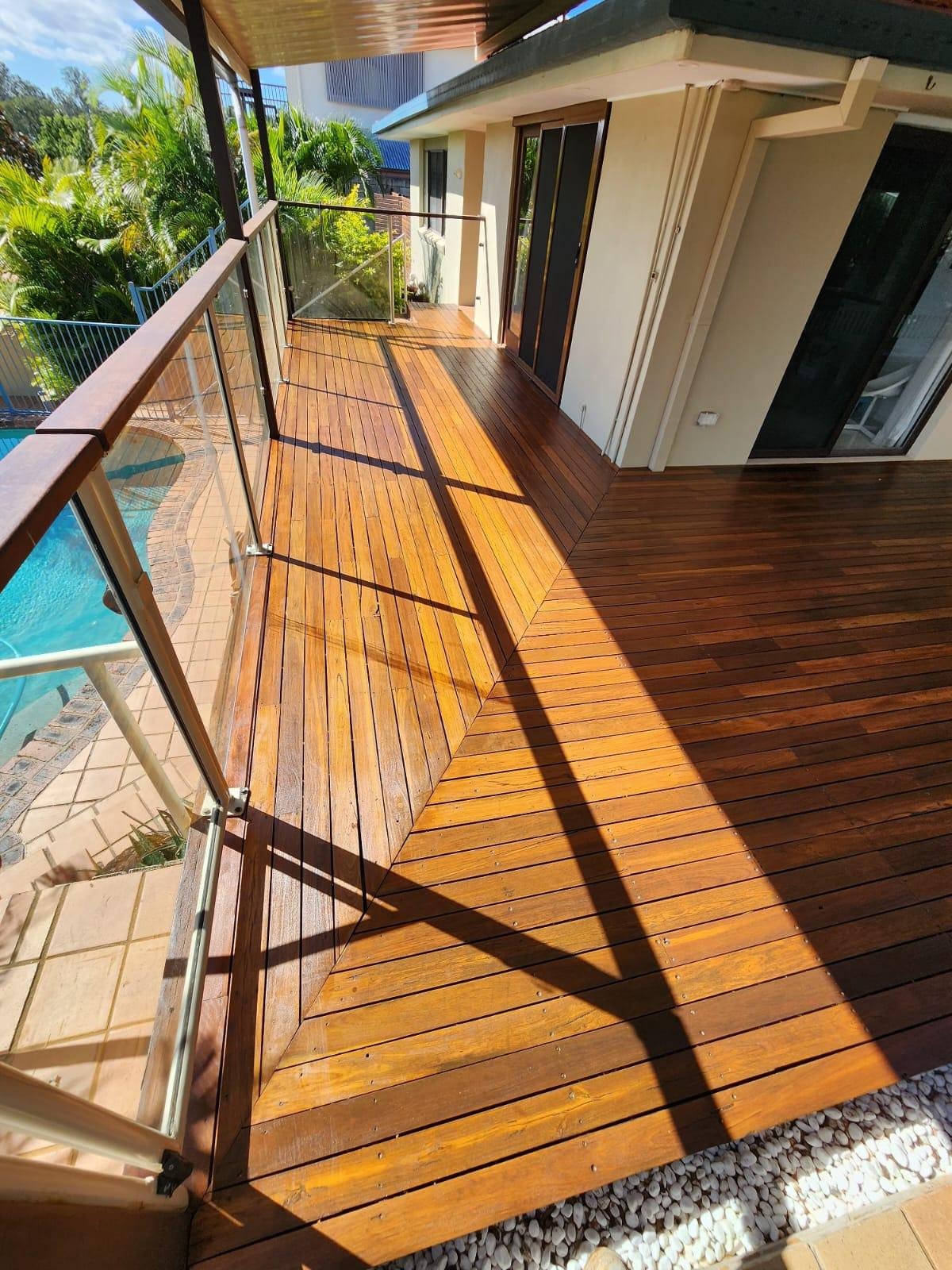 Poolside hardwood deck after sanding and oiling