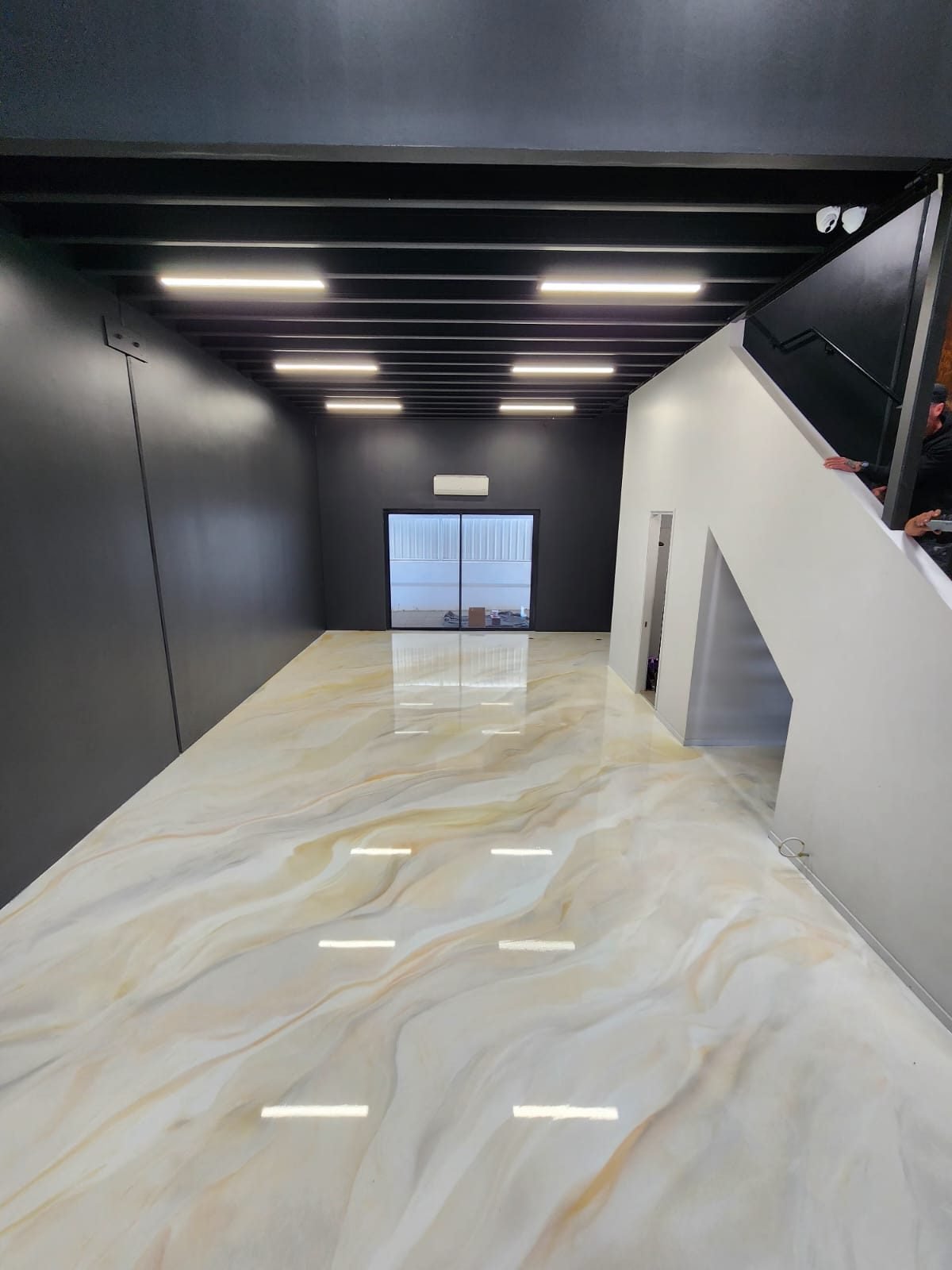 Premium metallic epoxy floor in a Brisbane commercial space