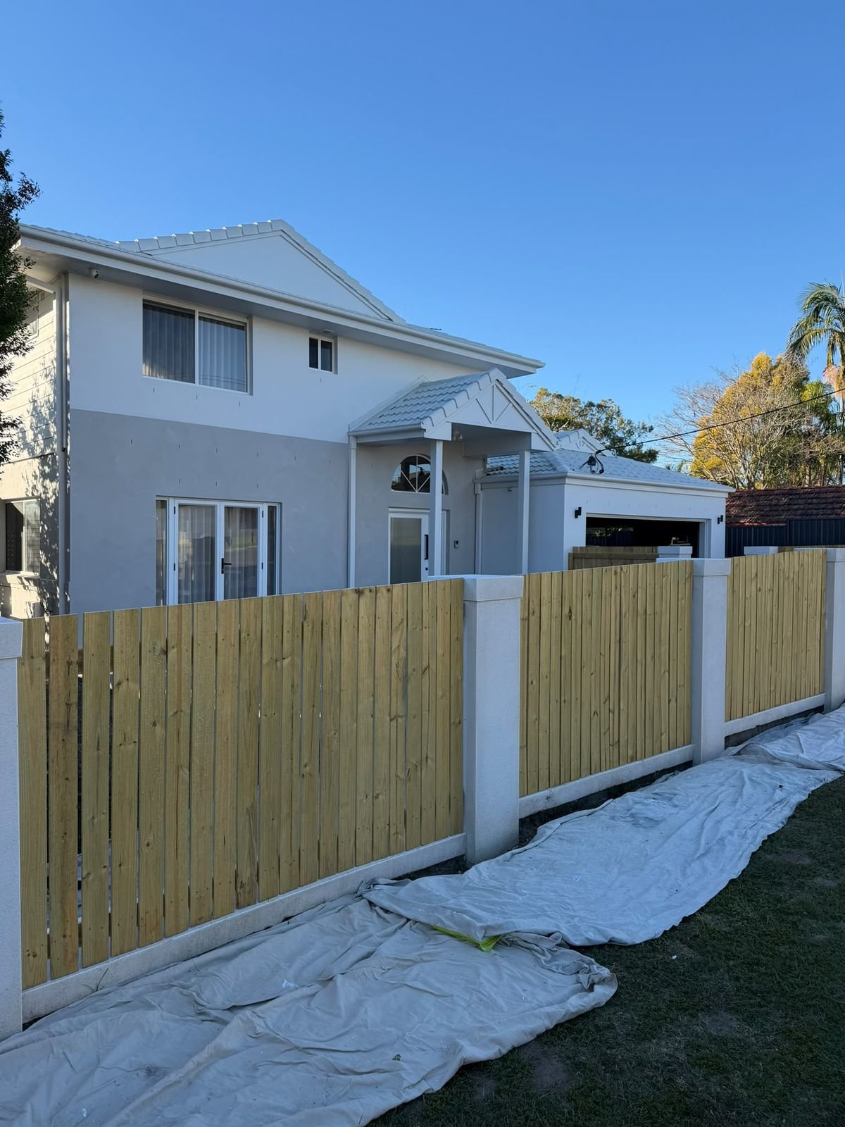 Untreated timber fence before painting in Brisbane