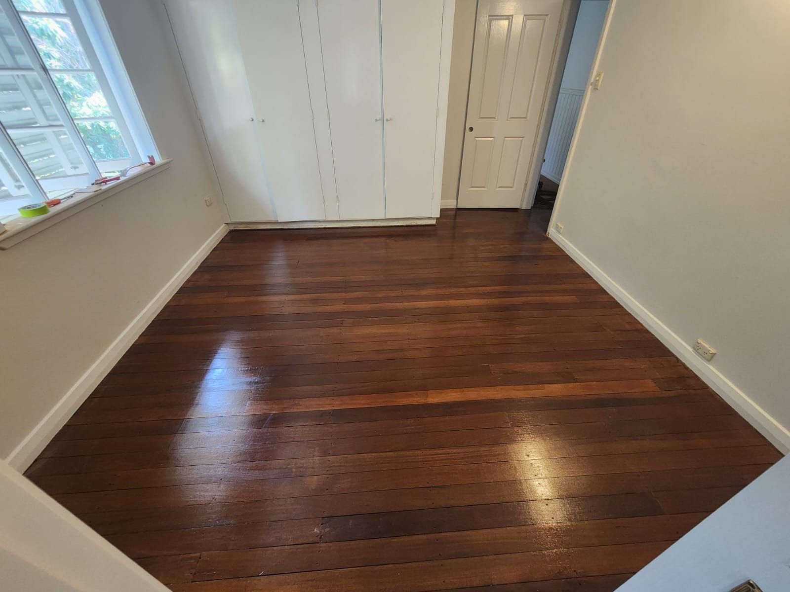 Restored hardwood floorboards in a Queenslander